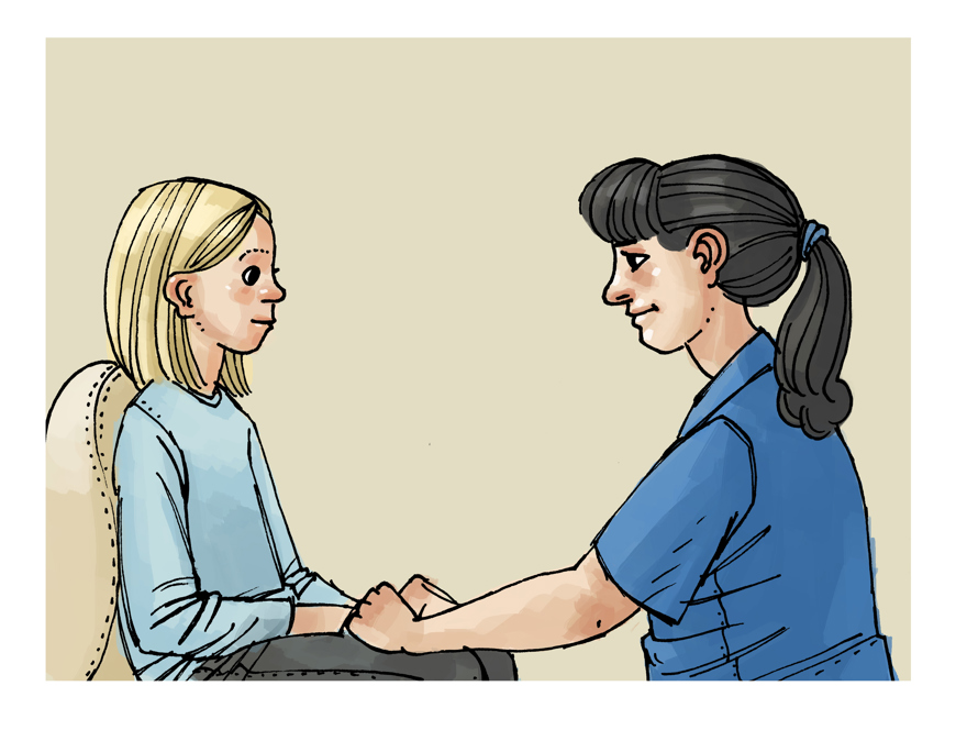 På bilden sitter en patient i en stol och behandlare framför patienten i ögonhöjd. De tittar på vandra.